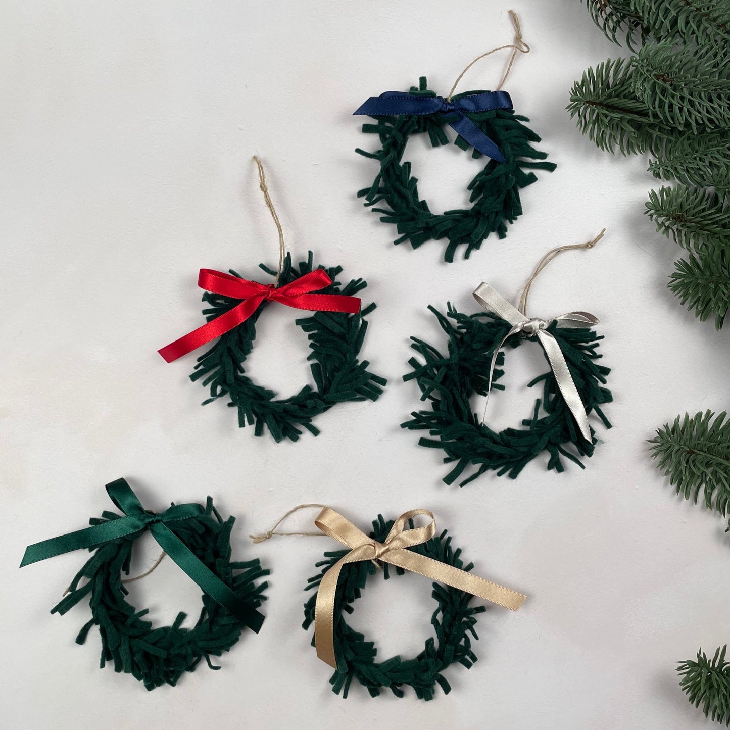 Mini Wreath Decoration - fully adorned with felt sprigs and includes a personalised calligraphy tag