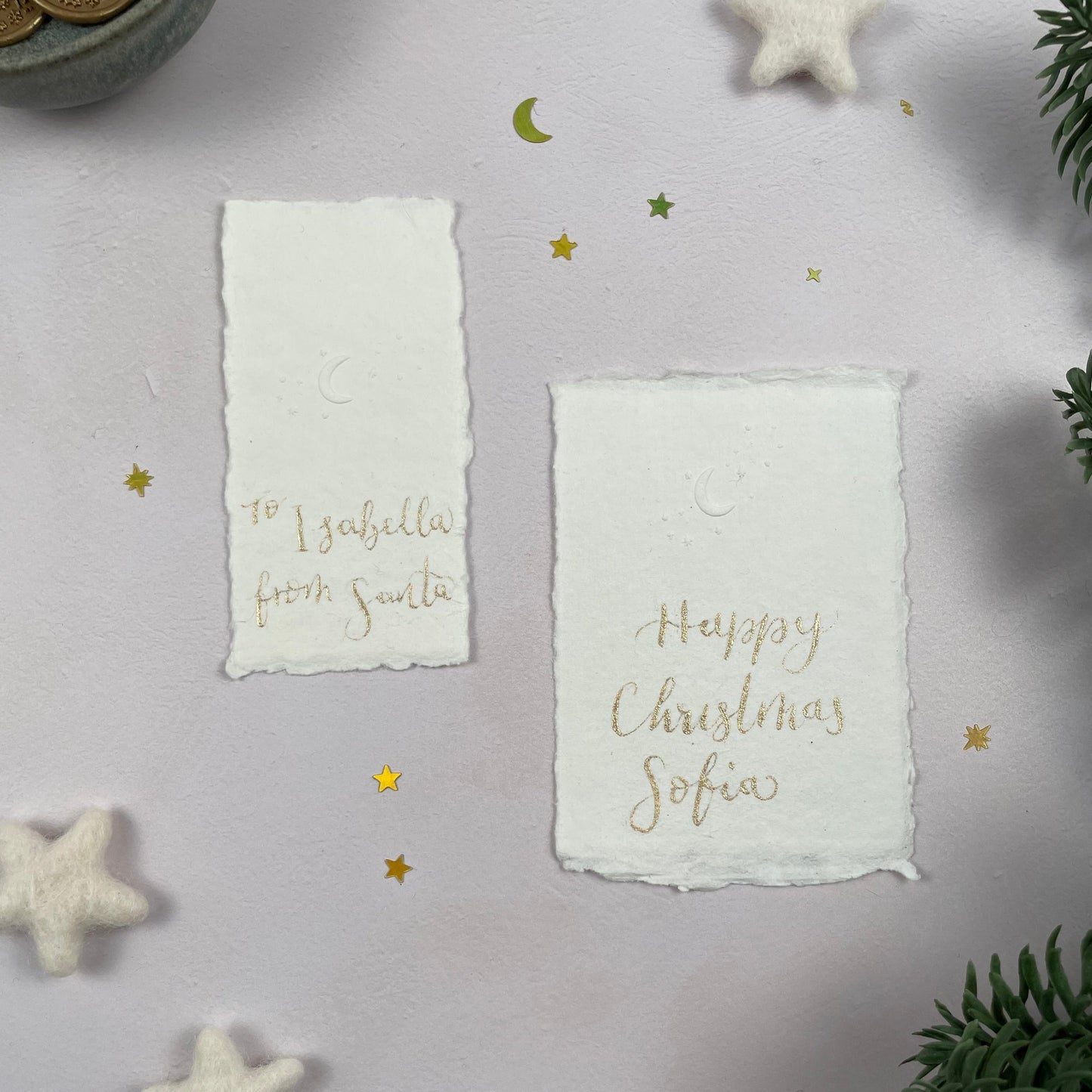 Christmas table place setting cards with celestial embossing detail