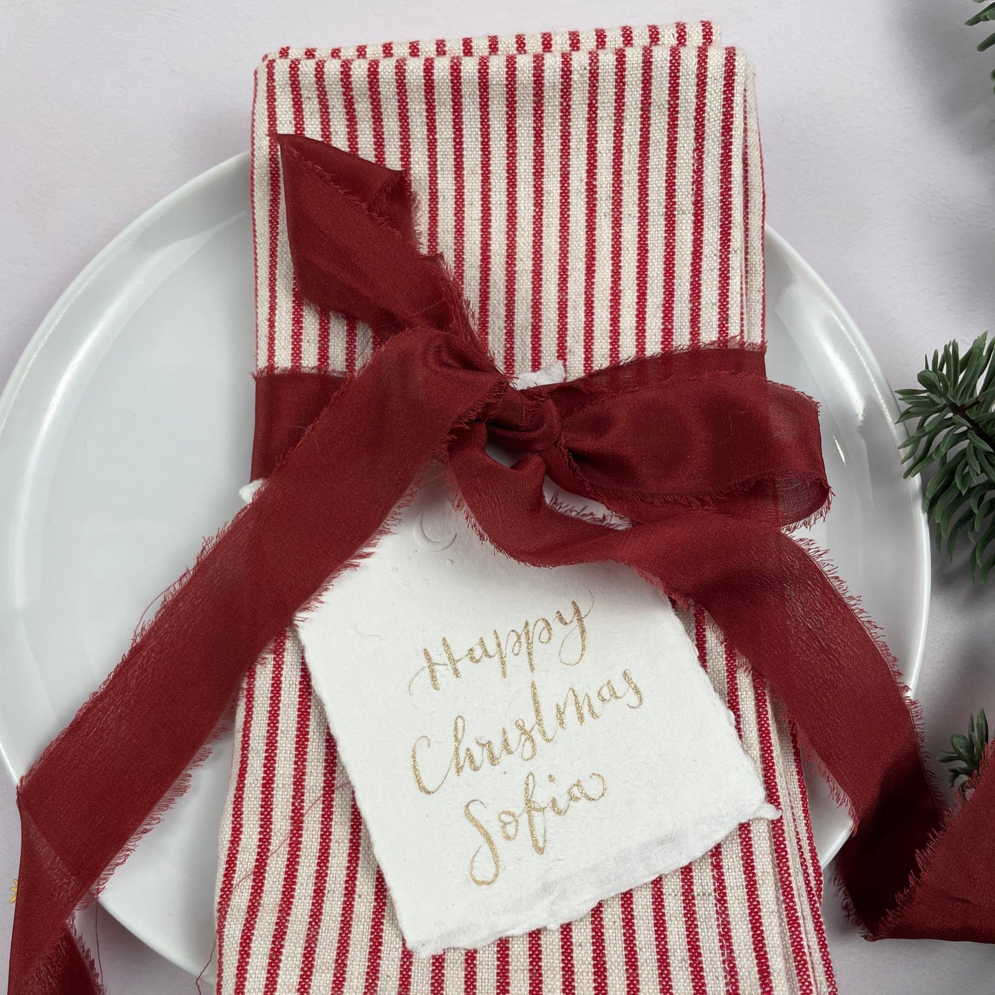 Christmas table place setting cards with celestial embossing detail