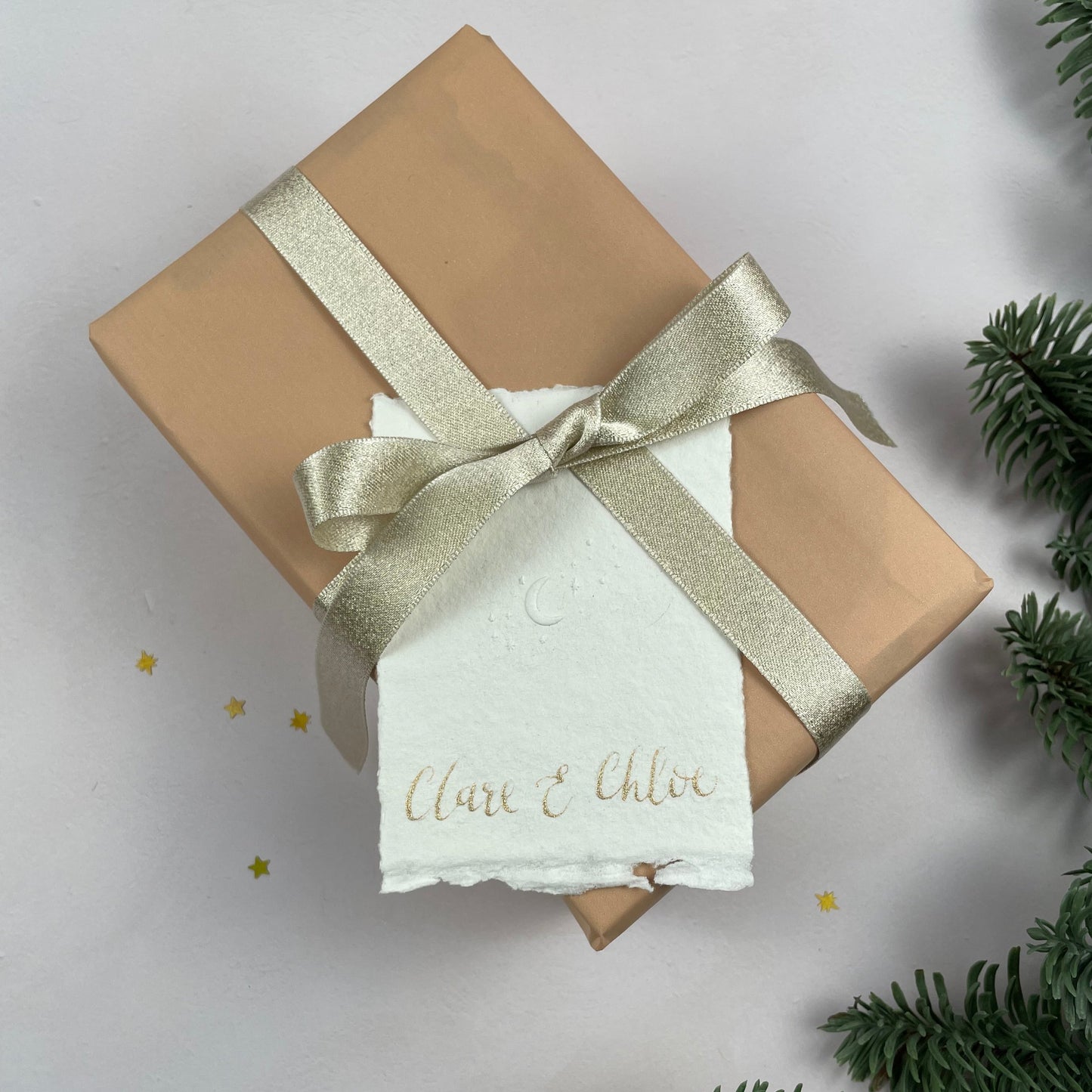 Christmas table place setting cards with celestial embossing detail