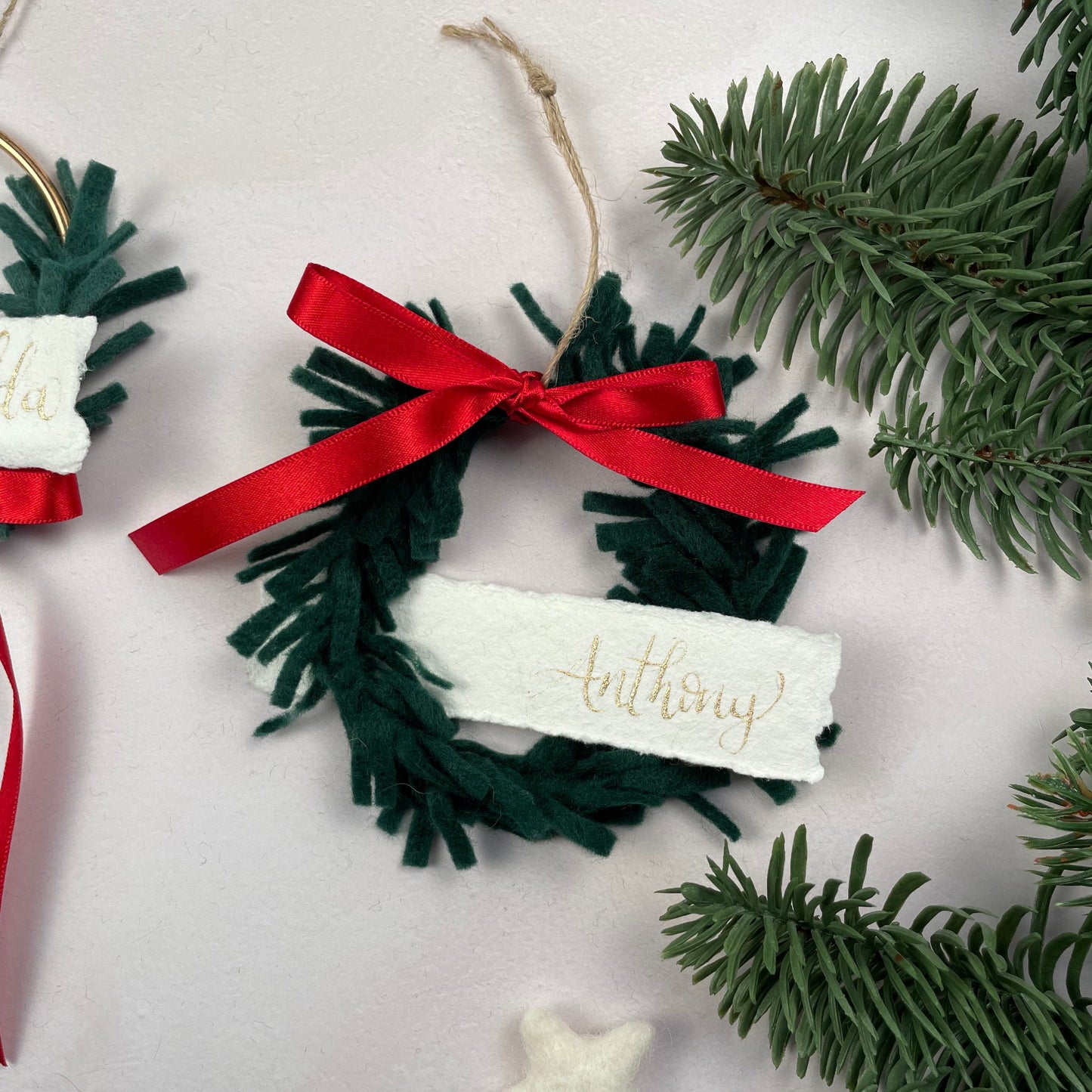 Mini Wreath Decoration - fully adorned with felt sprigs and includes a personalised calligraphy tag